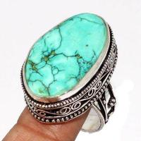 Tqa 499a bague chevaliere t57 13gr 30x20mm turquoise ethnique tibetaine vente bijou argent 925